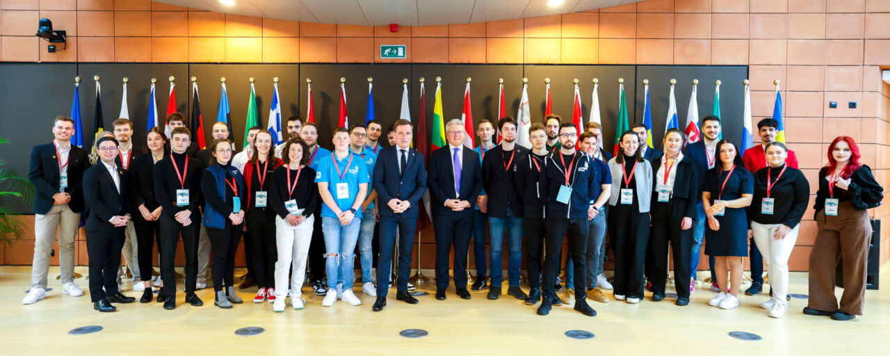 Participants at the event ‘Meet the Champions of Excellence’ in Brussels pose for a photograph on 23 February 2024.