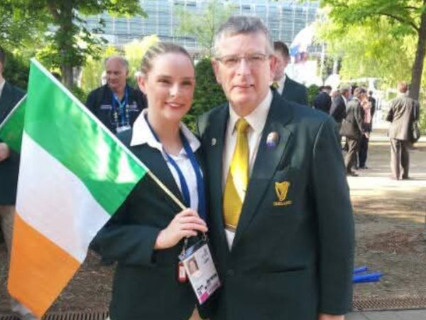 Fiona Currie holding an Irish flag with her father Ray Cullen.
