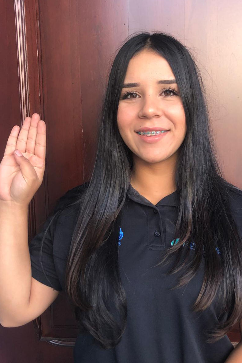 Katherine Ramírez Espinoza, wanted to demonstrate women can be mechanics, strikes the ChooseToChallenge pose.